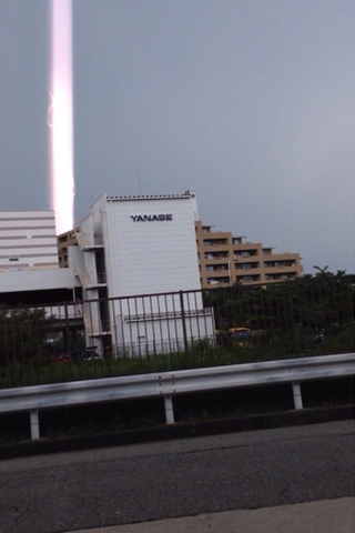 Illustration for article titled Strange Beams of Light Zapping Japan or iPhone Glitch? YOU PICK!